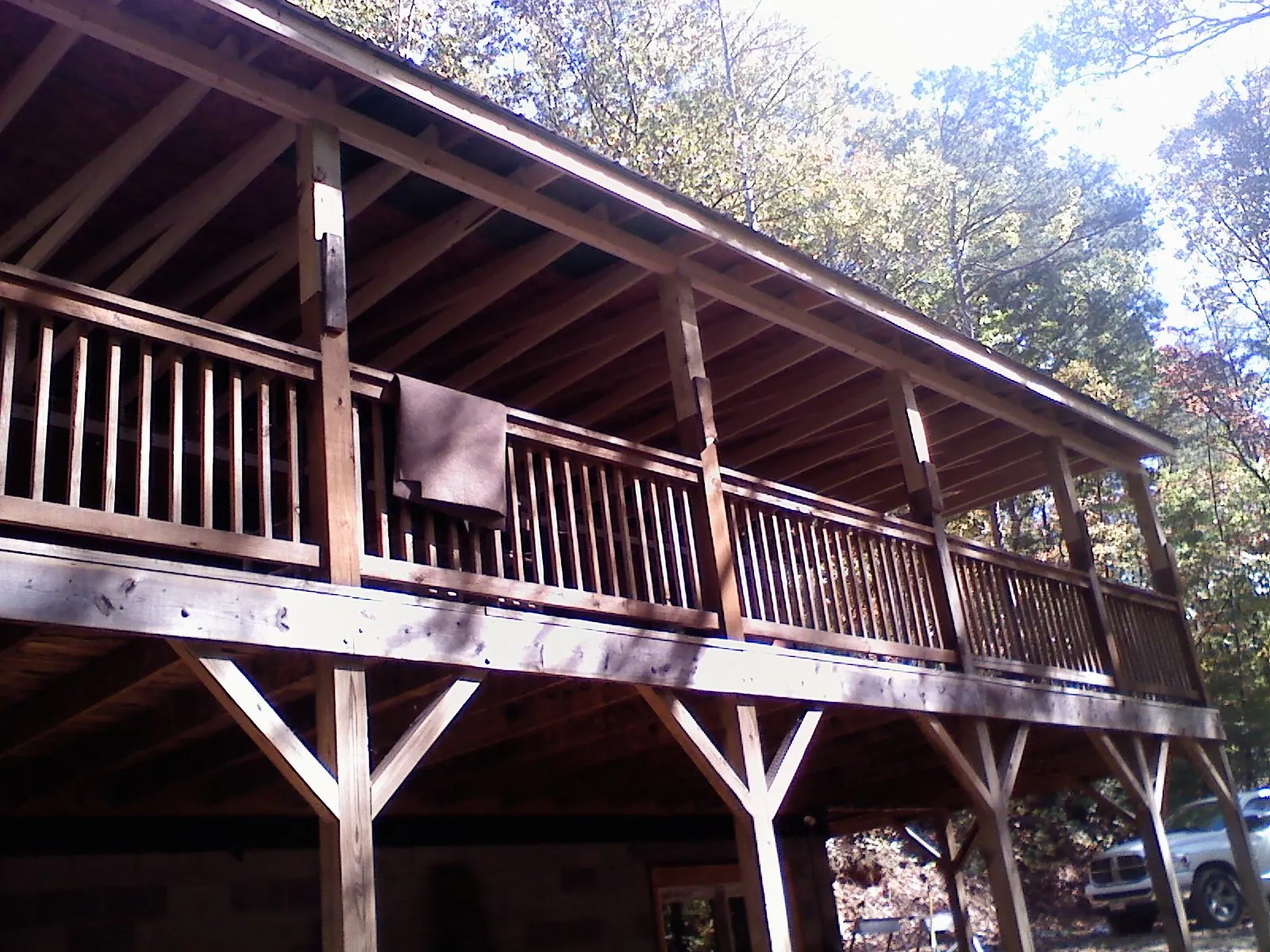 Timber framing under a new elevated porch and deck — Roof Leak Repair in Edgerton by Roofing Brothers